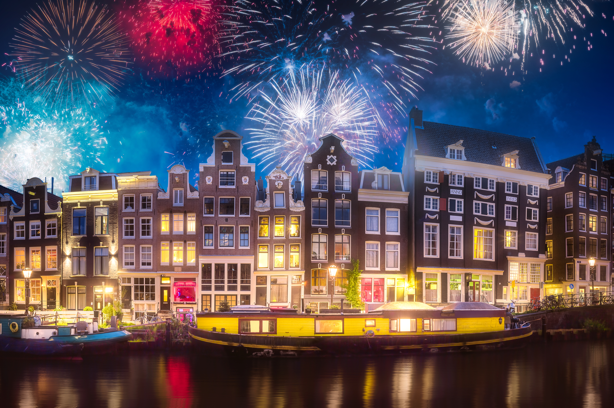 River, traditional old houses and boats, Amsterdam