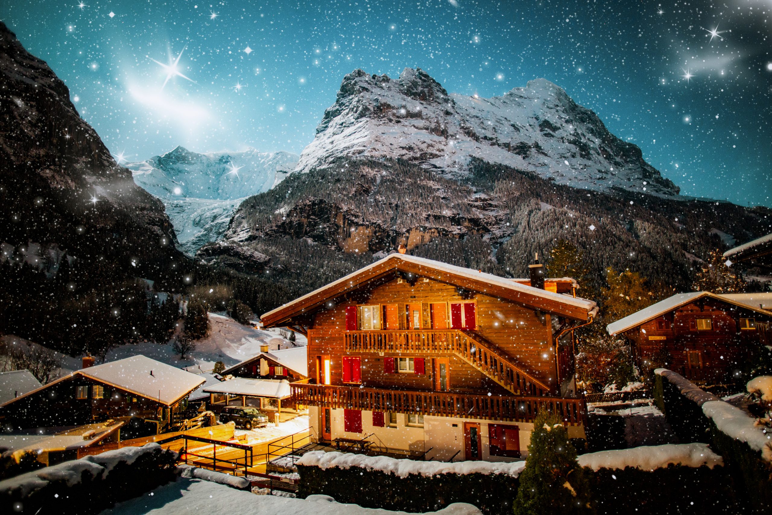 winter night Grindelwald snowy mountain, stars and wooden house