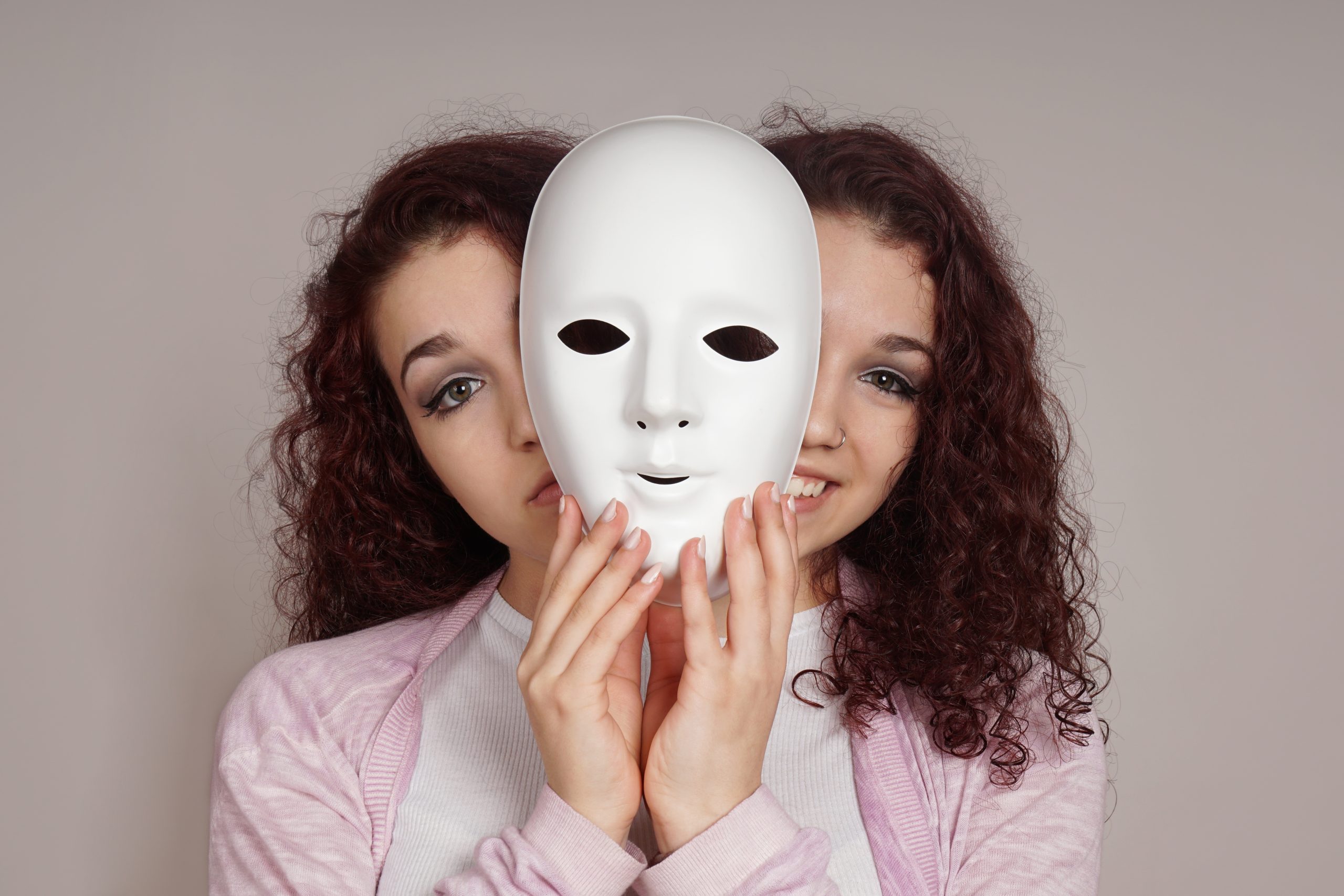two-faced happy sad woman manic depression or schizophrenia concept