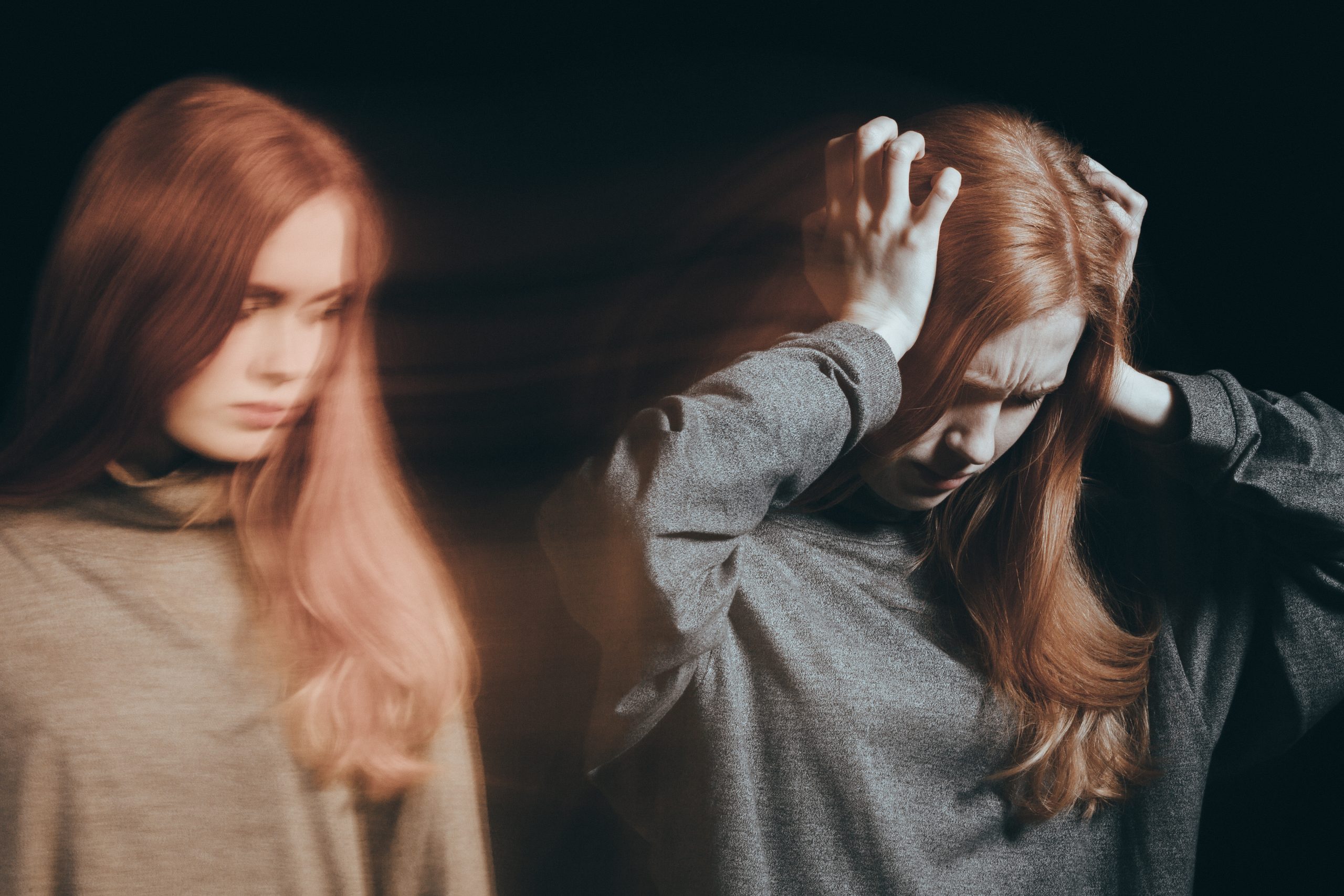 Woman having mood swing, suffering from depression