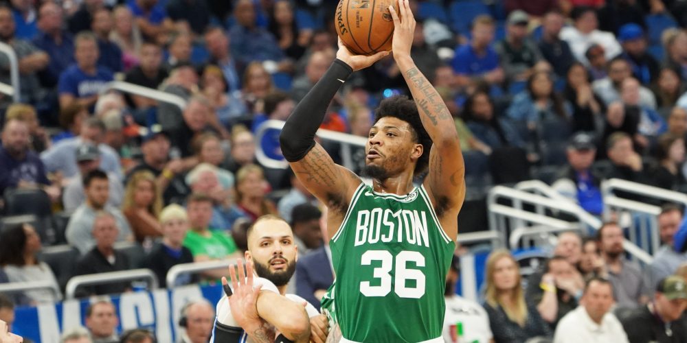 Boston Celtics player Marcus Smart #36 shoots a three point at the Amway Center on Friday January 24, 2020 in Orlando, Florida. Photo Credit: Marty Jean-Louis