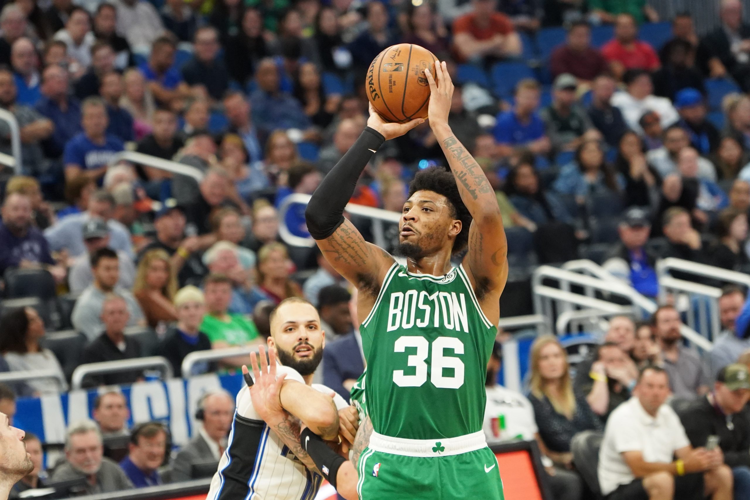 Boston Celtics player Marcus Smart #36 shoots a three point at the Amway Center on Friday January 24, 2020 in Orlando, Florida. Photo Credit: Marty Jean-Louis