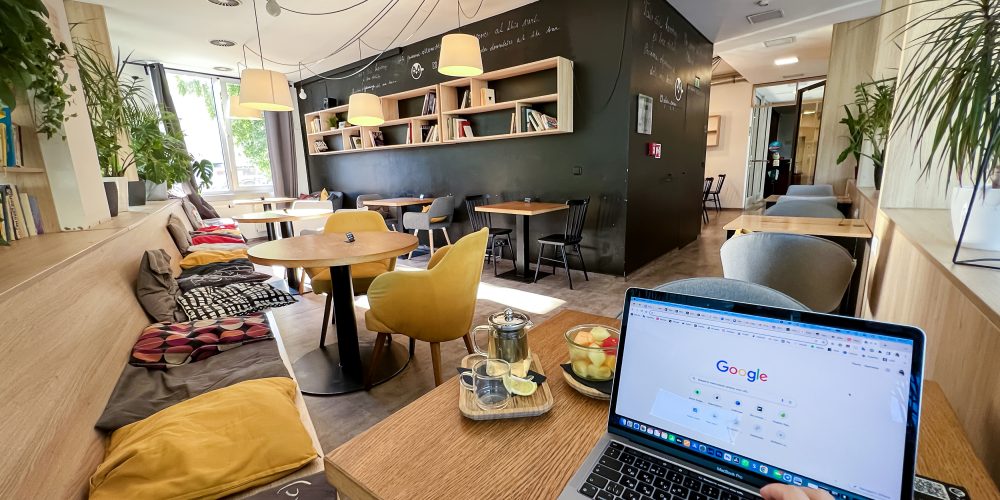 Prague, Czech republic - September 7, 2023: Interior of non-stop cafe with space for study. Coworking place popular among students for education and study in Prague