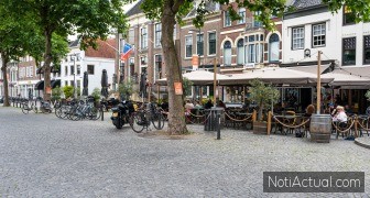 Zaltbommel, Gelderland, The Netherlands - People sitting on sunn