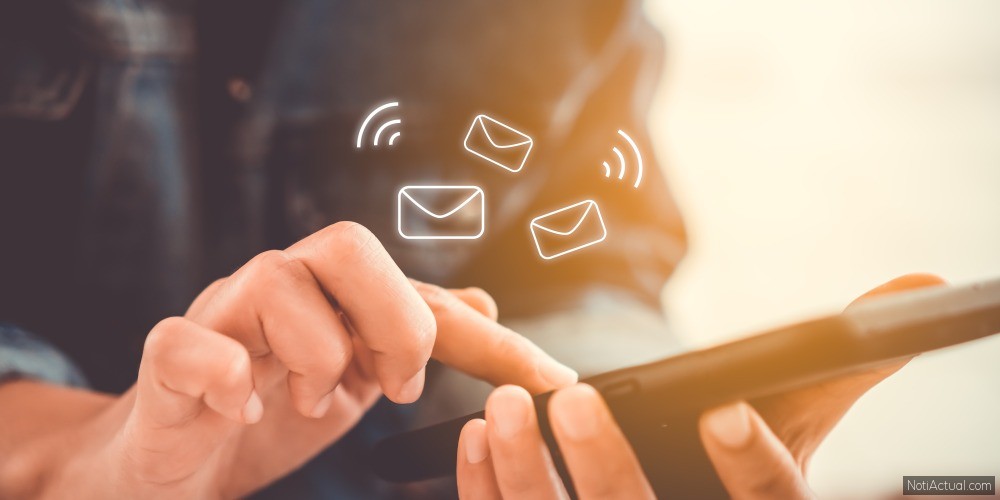 Woman hand using smartphone to send and recieve email. Business communication technology concept.