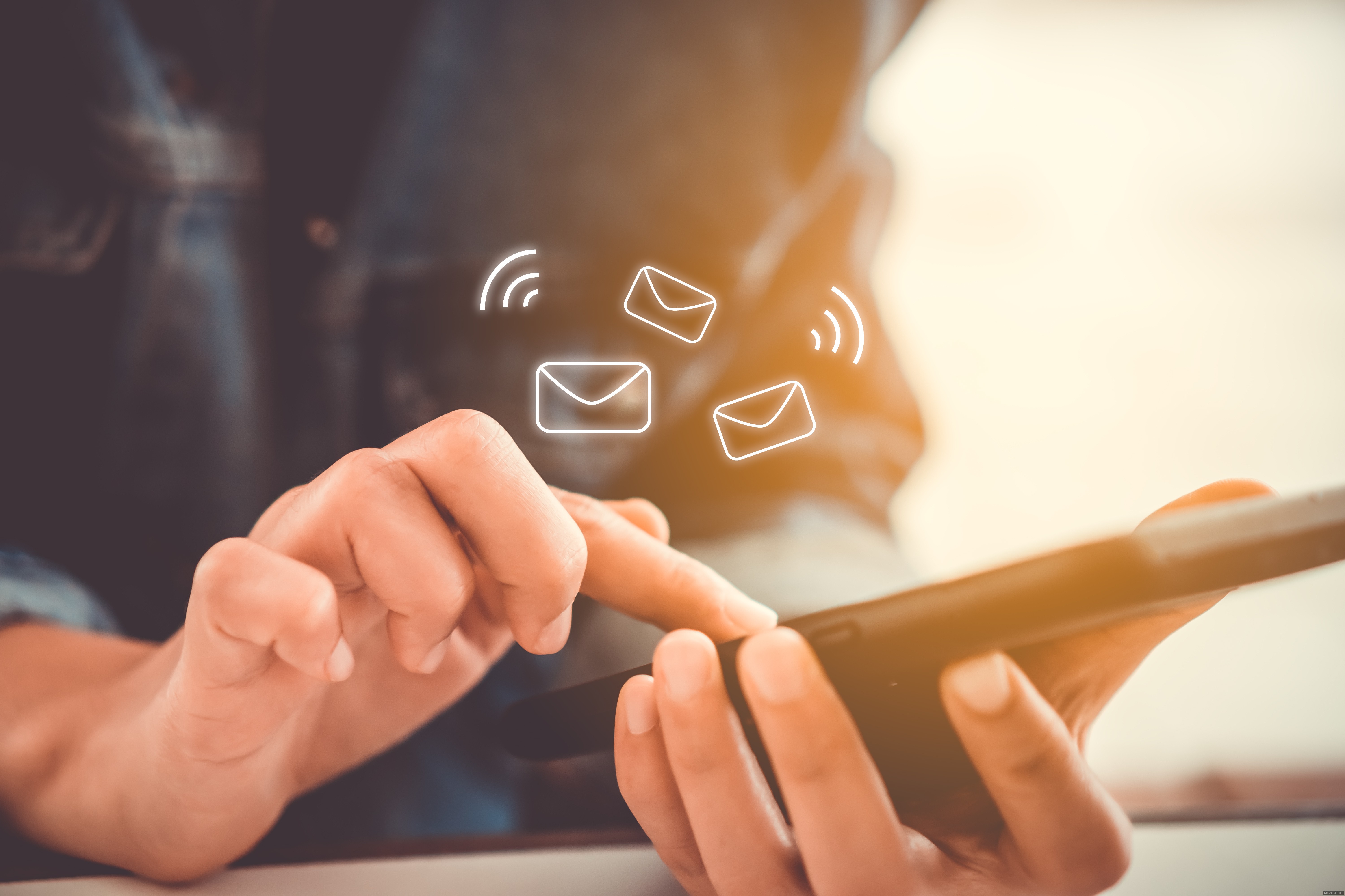 Woman hand using smartphone to send and recieve email. Business communication technology concept.