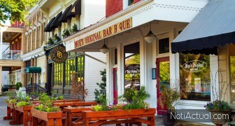 GRANVILLE, OH - MAY 15, 2017 Sidewalk seating is a feature at Moe's Bar B Que and other establishments on the main street of this charming east-central Ohio village