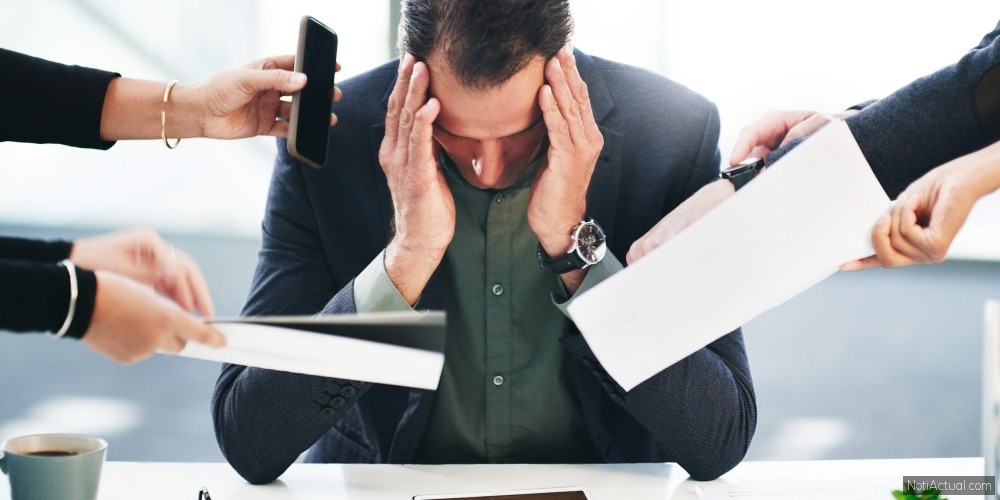 Anxiety, stress or burnout of management in office at bank with schedule conflict, fail or mistake. Tired, challenge or exhausted bank manager at corporate desk overwhelmed with work overload